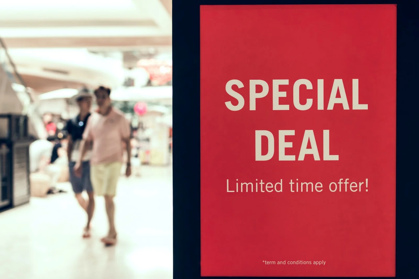 Red retail sign advertising a special deal for a limited time.