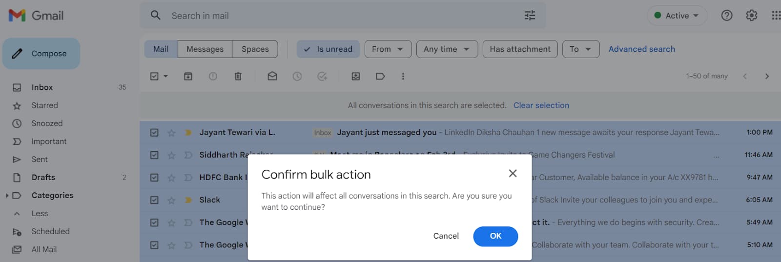 Gmail Confirm bulk action dialog with an OK button.